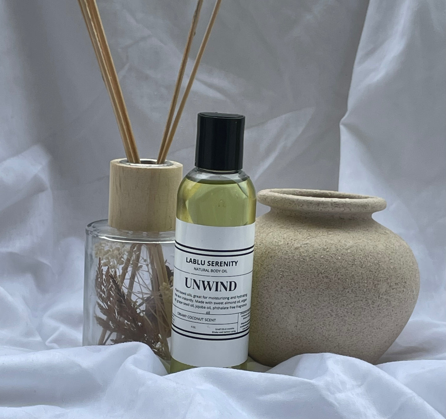 UNWIND BODY OIL (coconut scent)